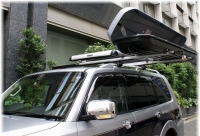 Багажник на крышу Thule Slide bar аэродинамический для DAEWOO Musso 5d кроссовер  (93-05) за дверной проем