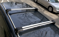 Багажник на крышу Thule WingBar EDGE крыловидный для  OPEL Combo, Combo Tour  (02-11) компактвэн 4/5d  штатное место