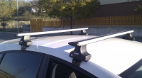 Багажник на крышу Thule Wing bar аэродинамический для PROTON Perdana 4d седан (93-10) за дверной проем
